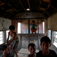 Children play inside an abandoned railway coach.